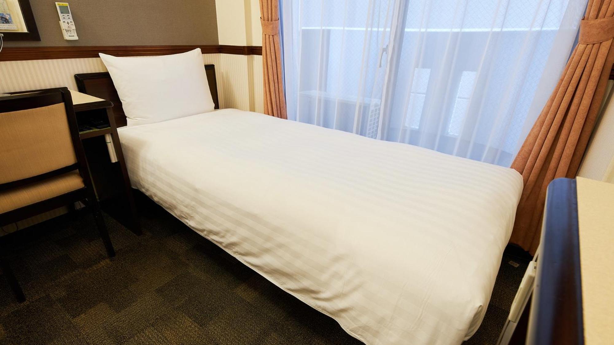 Toyoko Inn Tsudanuma-Eki Kita-Guchi Funabaši Pokoj fotografie